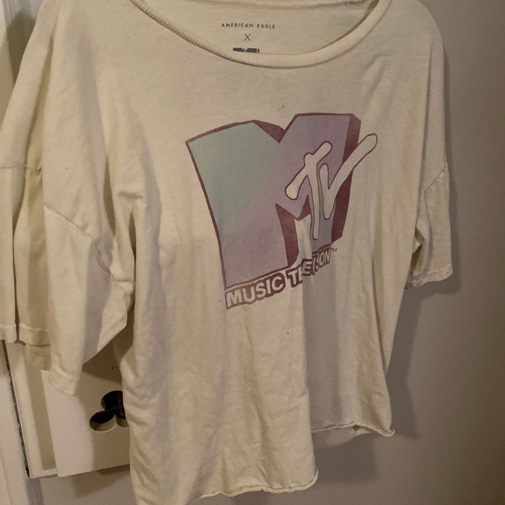 Light yellow mtv large T-shirt.